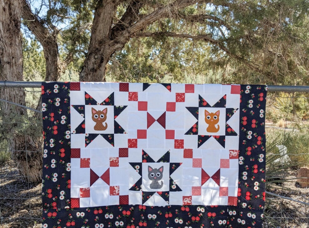 Kitty Cat quilt by Patchwork Posse with sawtooth stars and applique kittens